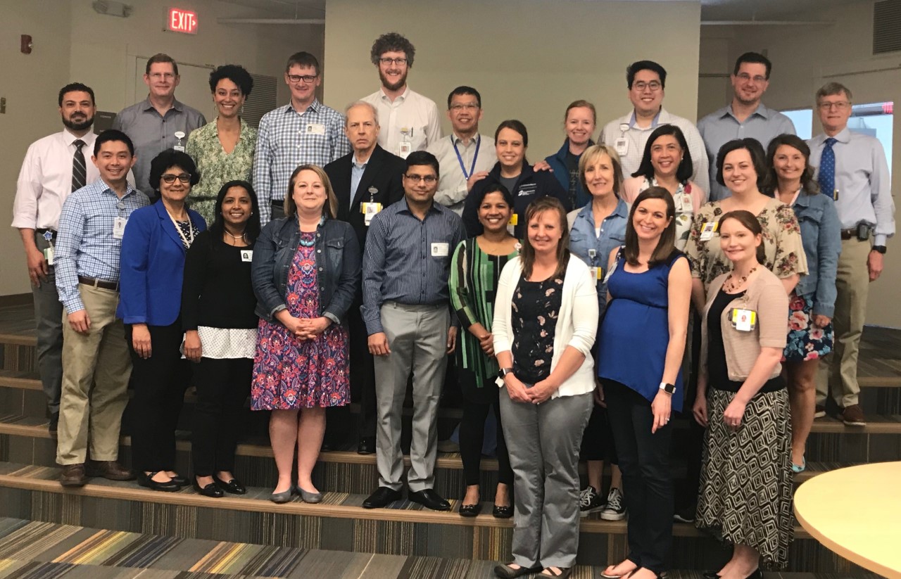 A group photo of the faculty and fellows of the Neonatal-Perinatal Medicine Fellowship at Children's Mercy.