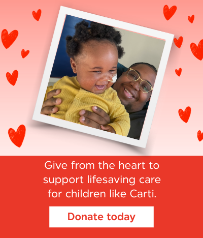 Photo of a child in a yellow shirt holding hands with an adult, framed on a red background with hearts and text: Give from the heart to support lifesaving care for children like Carti. Donate today.