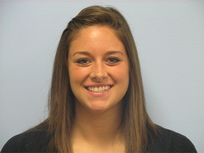 Headshot of Shauna Beckett smiling.