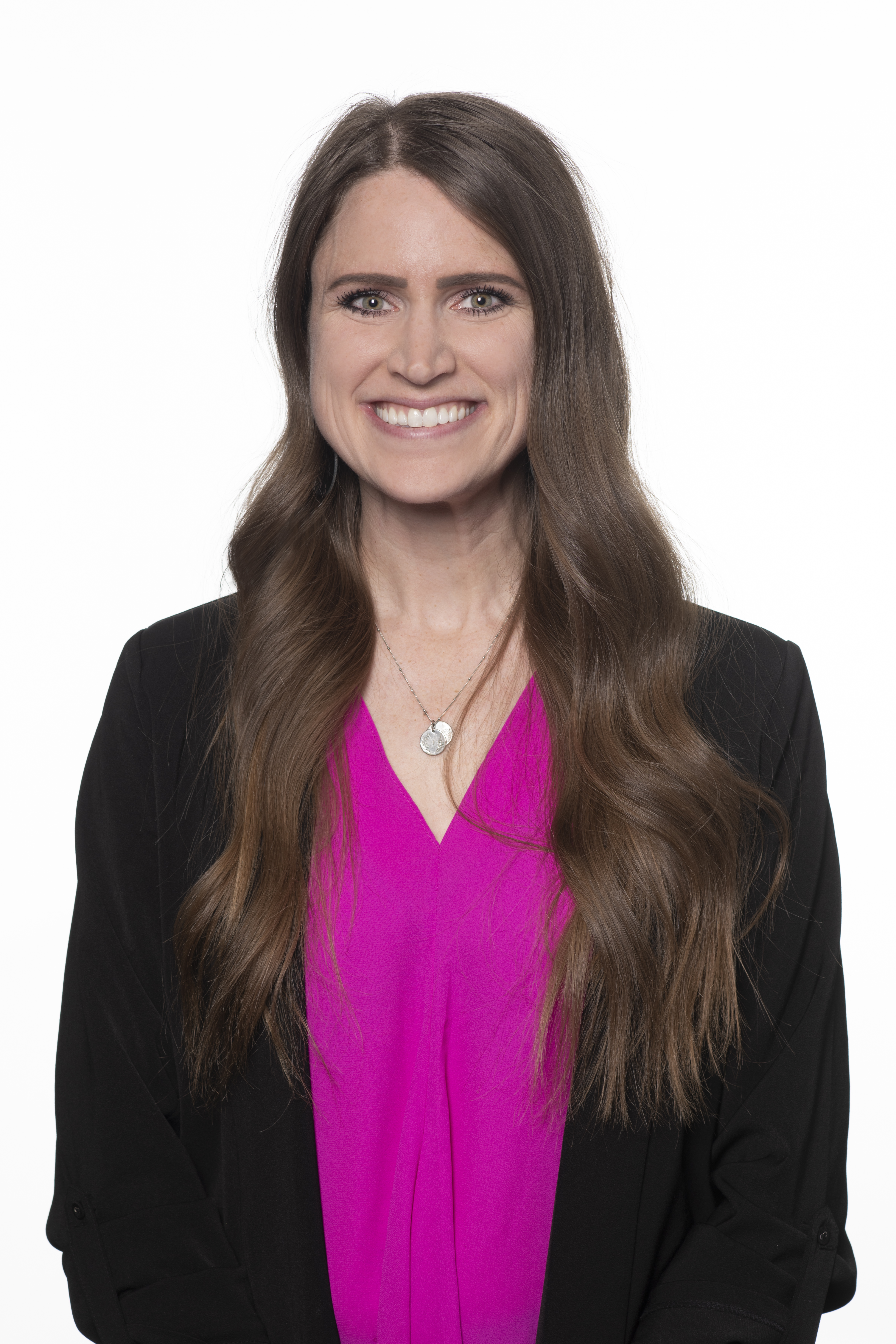 Headshot of Michaela Norton smiling.