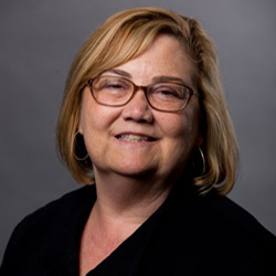 Headshot of Mary Tomlinson.