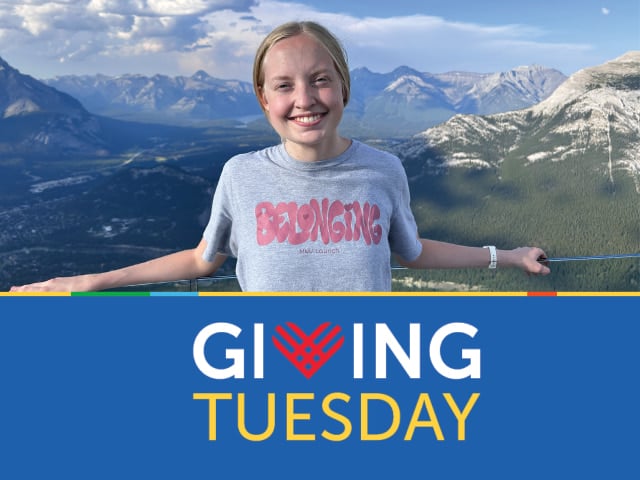 A teenage girl with blond hair poses in front of a mountain range. Text reads Giving Tuesday.