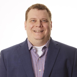 Headshot of Tyler Allison, MD smiling.