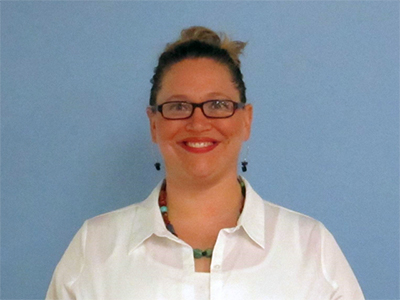 Head shot of Emily Barker smiling.