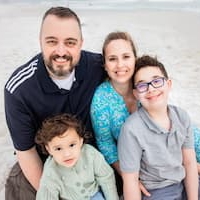 Allen Hall, his wife, and children