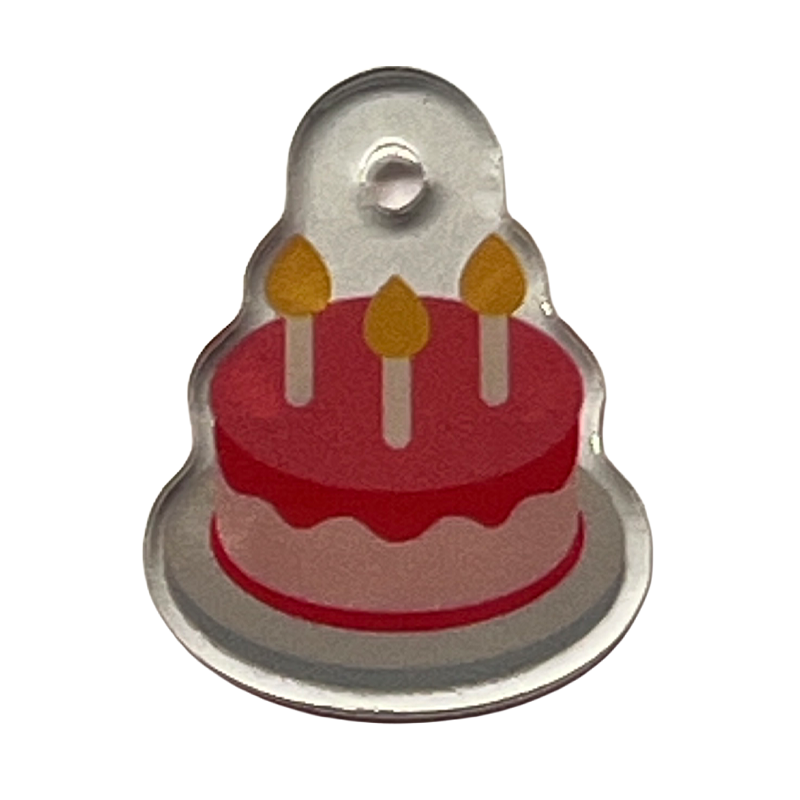 Acrylic charm with a birthday cake icon.