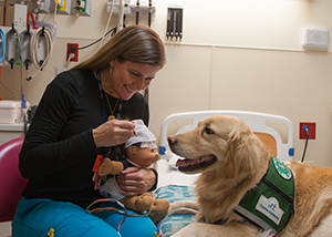 A Child Life Specialist visits Hope in the EMU at Children's Mercy.