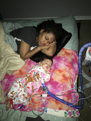 Mom, Erika and patient, Birdie at home.