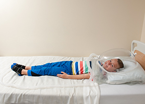 A child lays still for their test in the Kidney Center at Children's Mercy,