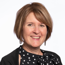 Mary Ann Queen, MD smiling.